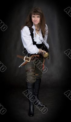 The girl - pirate with a sabre in hands