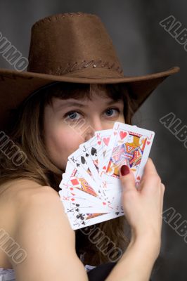 Portrait girl with a playing-cards