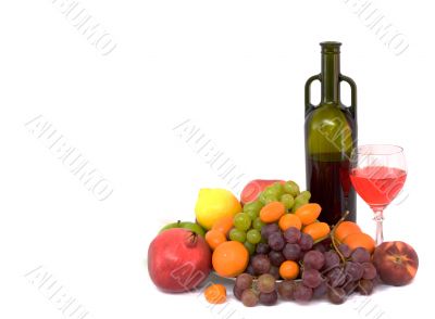 Bright still life with wine and fruit