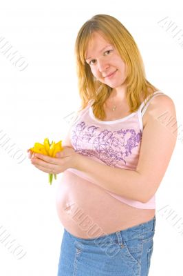 pregnant woman with yellow flowers