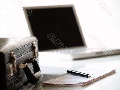 Suitcase and Laptop