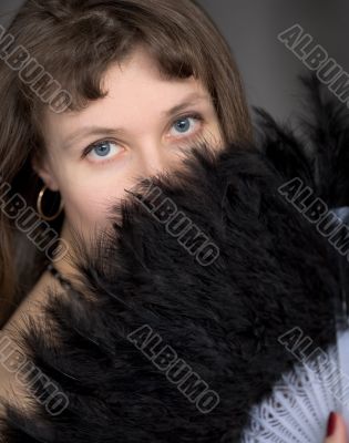 Portrait of the girl with a fan
