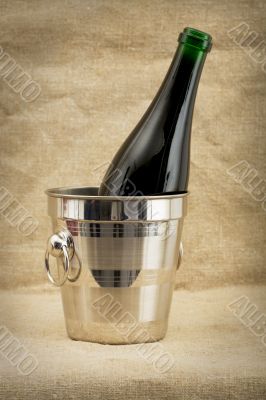 Champagne bottle in metallic bucket