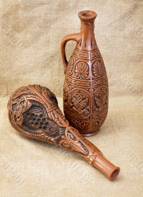 Two ceramic brown bottles