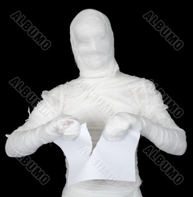 Mummy tear in pieces sheet of paper Mummy tear in pieces sheet of paper