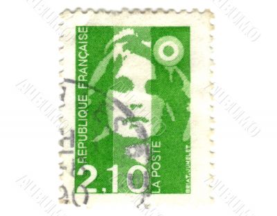 Old green french stamp with woman head
