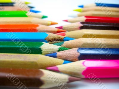 Color pencils in arrange with focus on middle