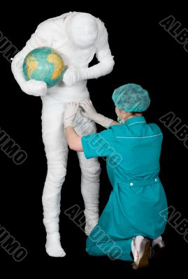 Doctor to nurse on bandaged patient