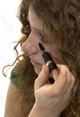 red haired female teenager with mascara