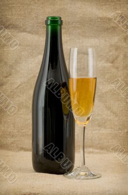 The champagne bottle and glass