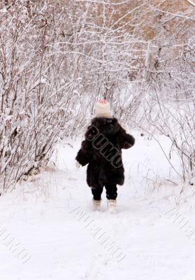 child on winter forest child on winter forest