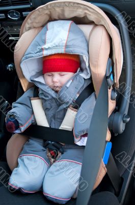 Child in safety seat