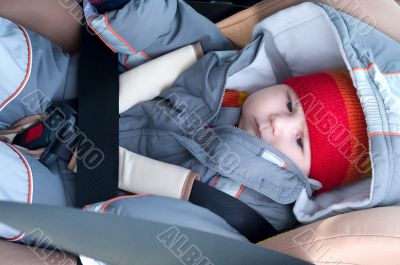 Child in safety seat