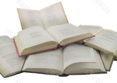 Many open books isolated over white