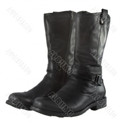 Fashionable  brutal leather male boots on a white background