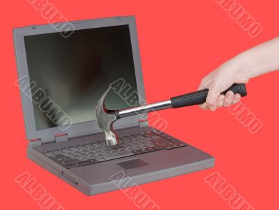 The laptop and hammer