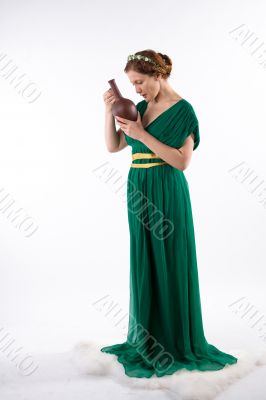 Lady in green handing jug