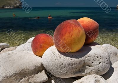 Juicy Peaches on sea background Juicy Peaches on sea background