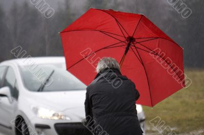 red Umbrella at rainy weather