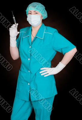 Nurse with syringe in hand