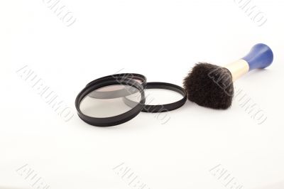 Lens filters and brush
