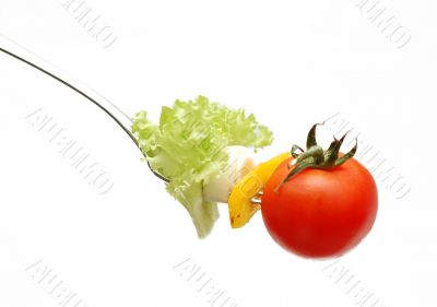 cherry tomato on fork
