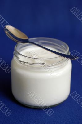 yogurt on blue background