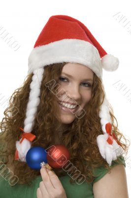 Christmas, red haired teenager with decoration