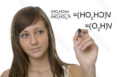 Female student with chemical formula on glass wall