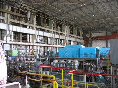 Machinery, tubes and steam turbine at a power plant