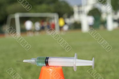Syringe at football field