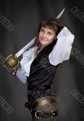 Pirate - girl with a sabre in hand on a black