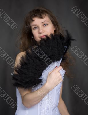Portrait of the girl with a fan