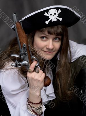 Girl - pirate with pistol in hand