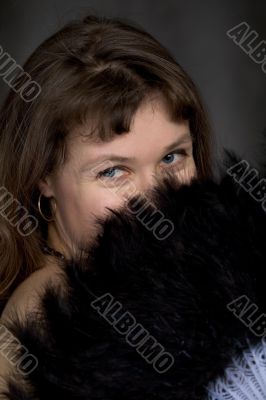 Portrait of the girl with a fan