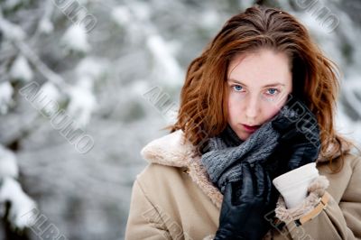 Winter landscape woman enjoying her shawl