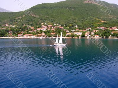 Sailing boat over blue water