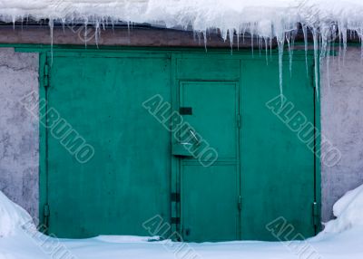 Green gates in snow