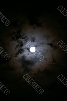 Full Moon on the sky with clouds