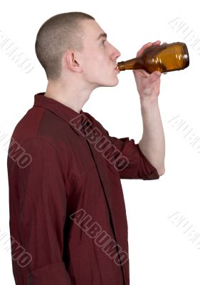 Young man with brown bottle
