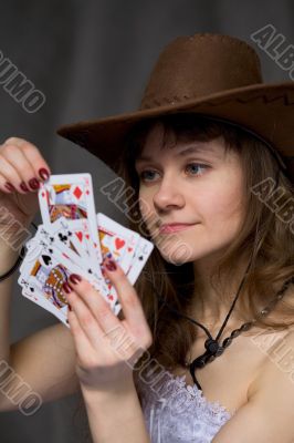 Portrait girl with a playing-cards