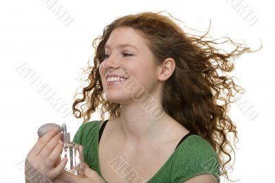 red haired teenager with perfume