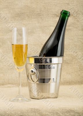 Still-life with a glass of wine and a bottle