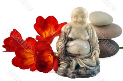 Laughing Buddha, red day-lilies  and stones.
