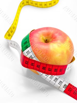 Red apple with tape measure