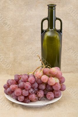 Bottle of wine and grape