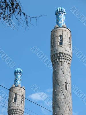 The minaret on the blue sky