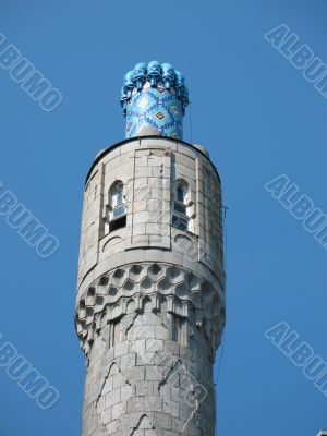 The minaret on the blue sky