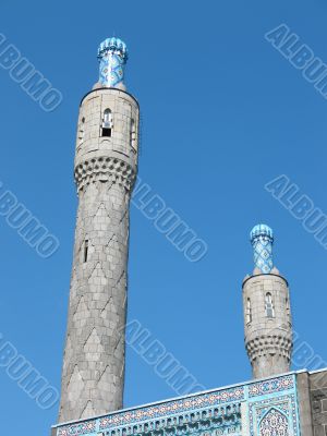 The minaret on the blue sky