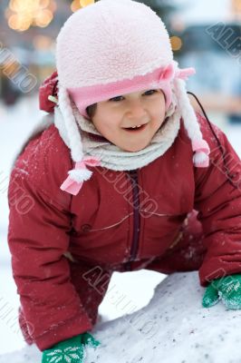 Cute child likes winter fun